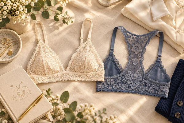 Illustrated triangle and racerback lace bralettes beside a blouse and a notebook embossed with a subtle bee face.