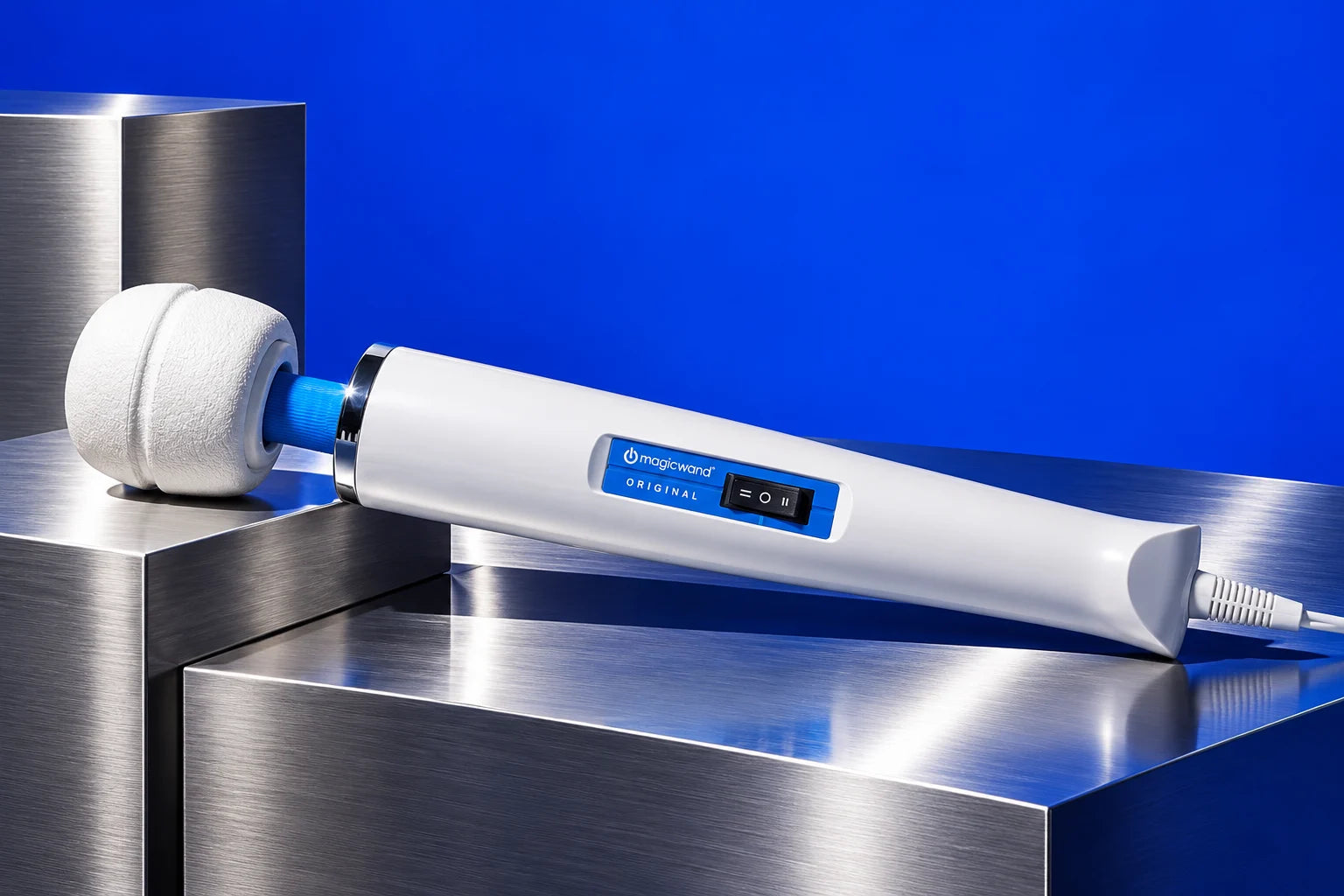 Magic Wand Original with a blue neck, two-speed switch, and attached power cord on a chrome set.