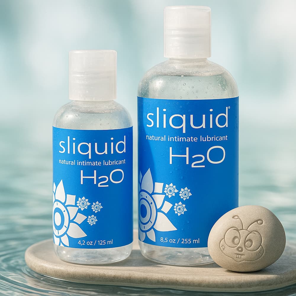 Sliquid H2O water-based formula bottle shown on a ocean inspired background
