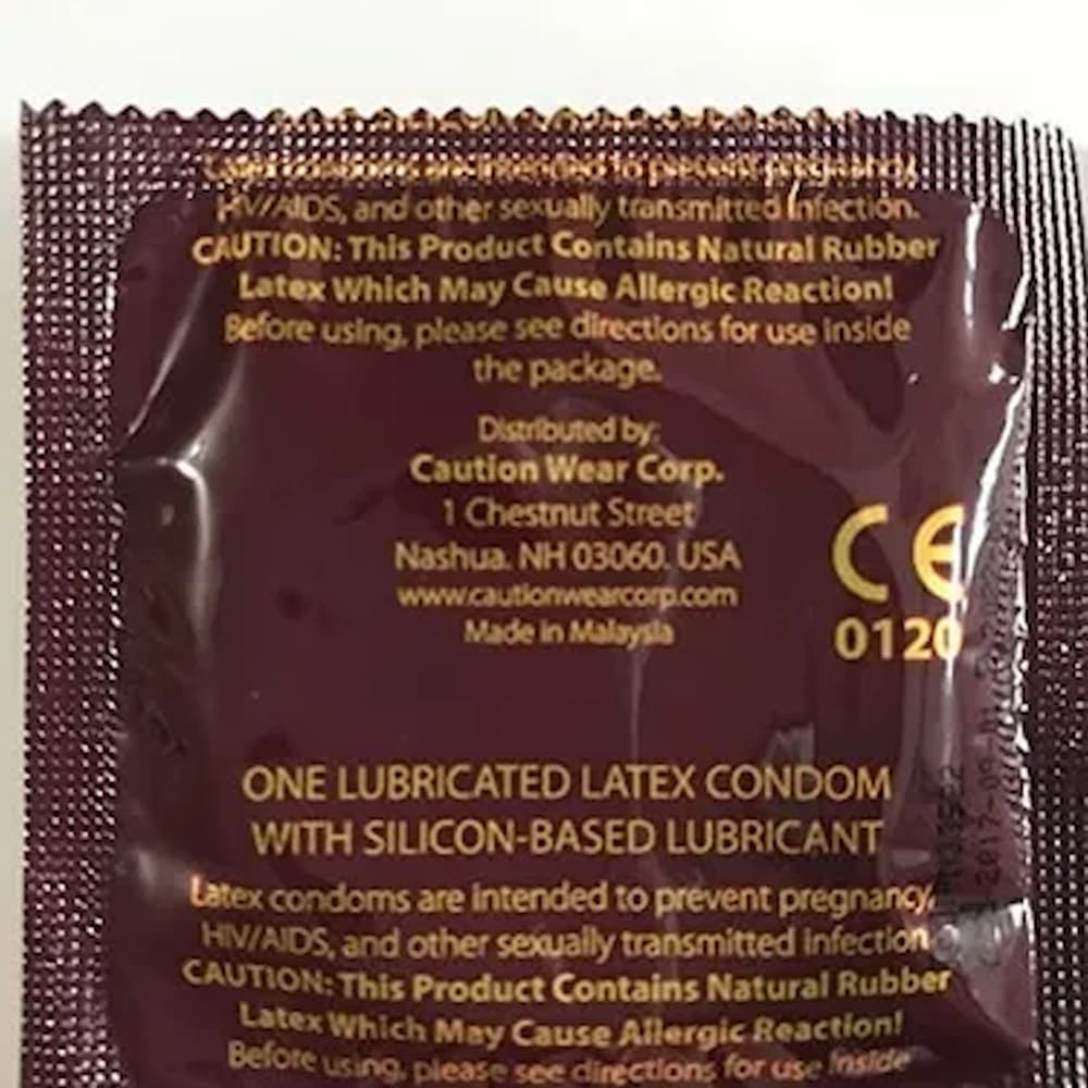 Caution Wear Grande Condom Back