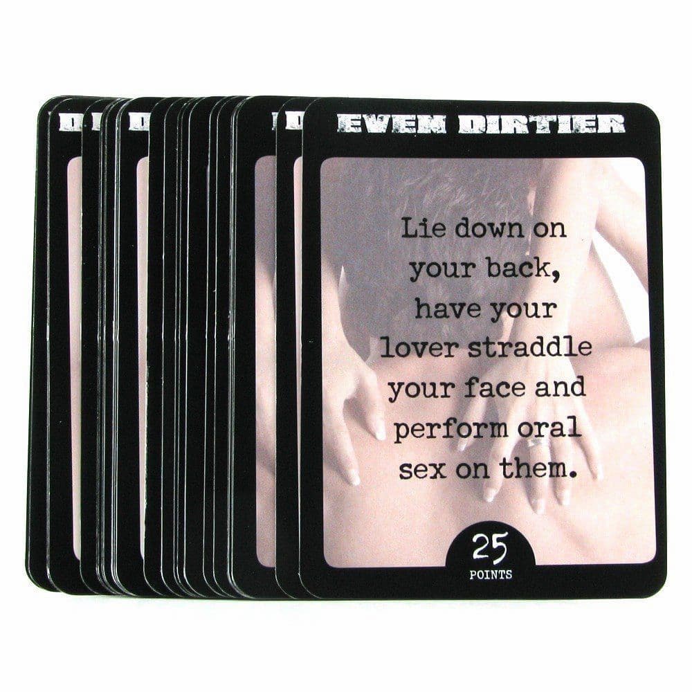 Hands holding Dirty Deeds cards, lighthearted adult party game for two