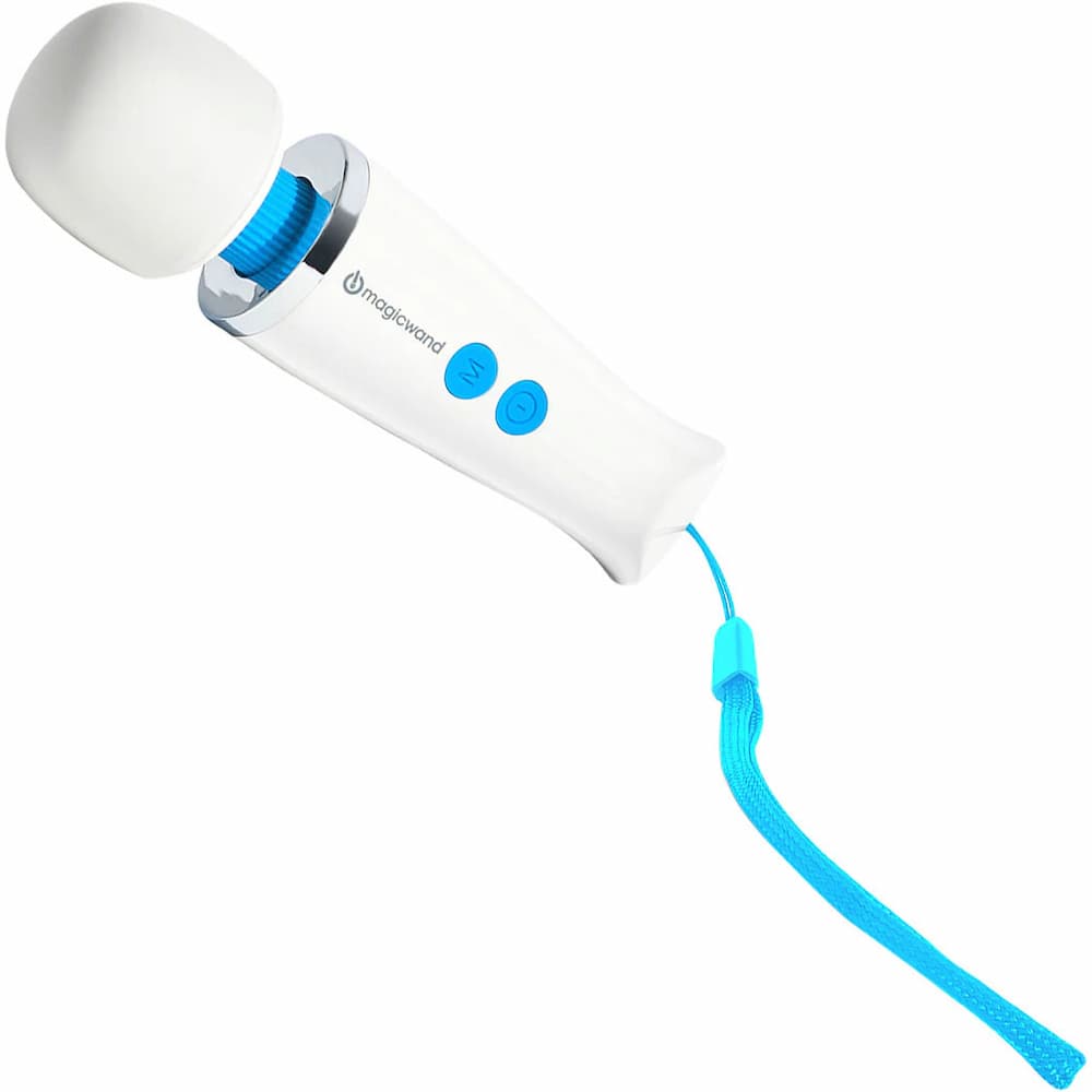 Magic Wand Micro massager placed next to keyring strap for travel-ready use