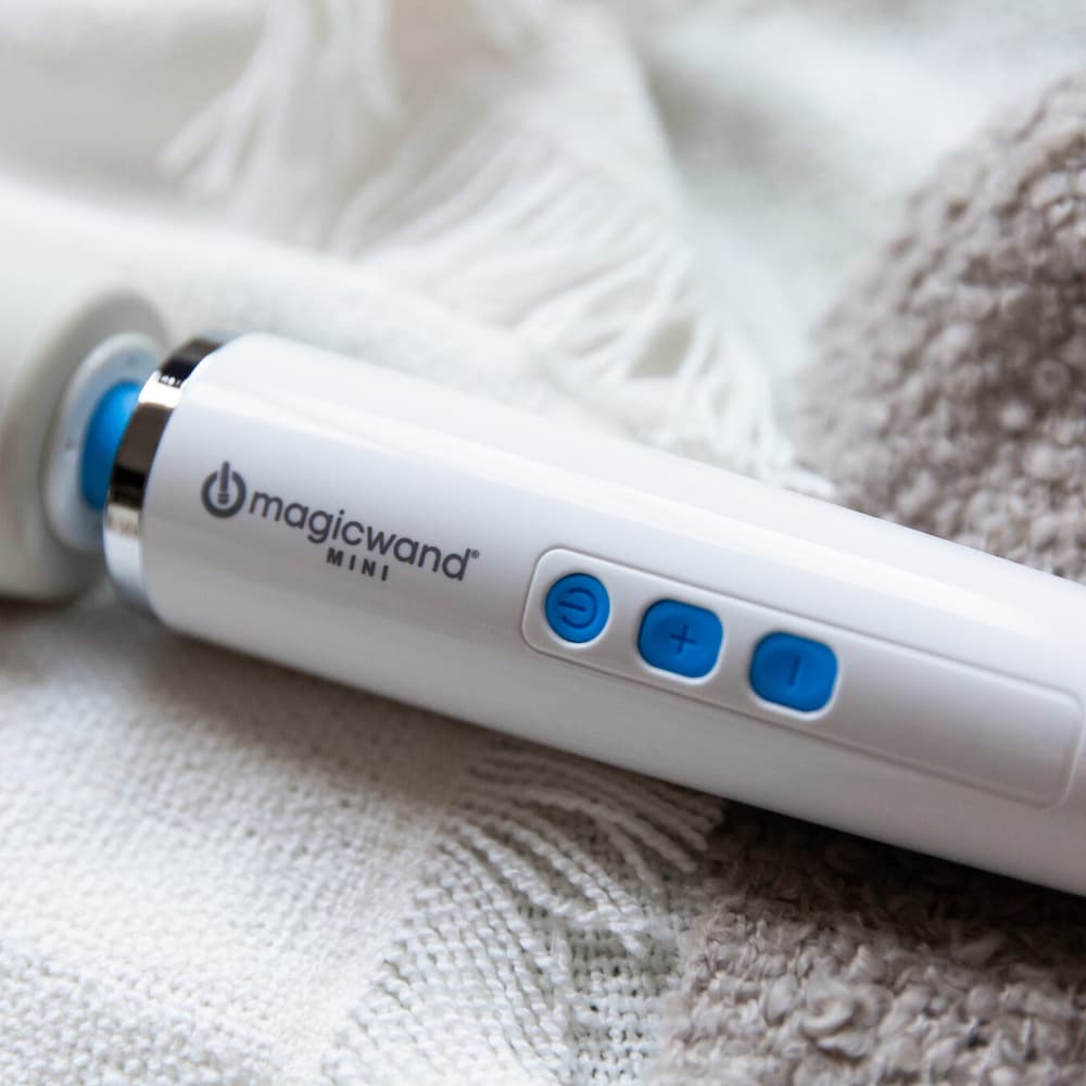 Magic Wand Mini compact wand massager with three-speed control buttons