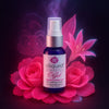 Sliquid O Gel bottle surrounded by pink flowers on a purple background