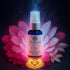 Sliquid O Gel bottle against pink petals and blue lighting