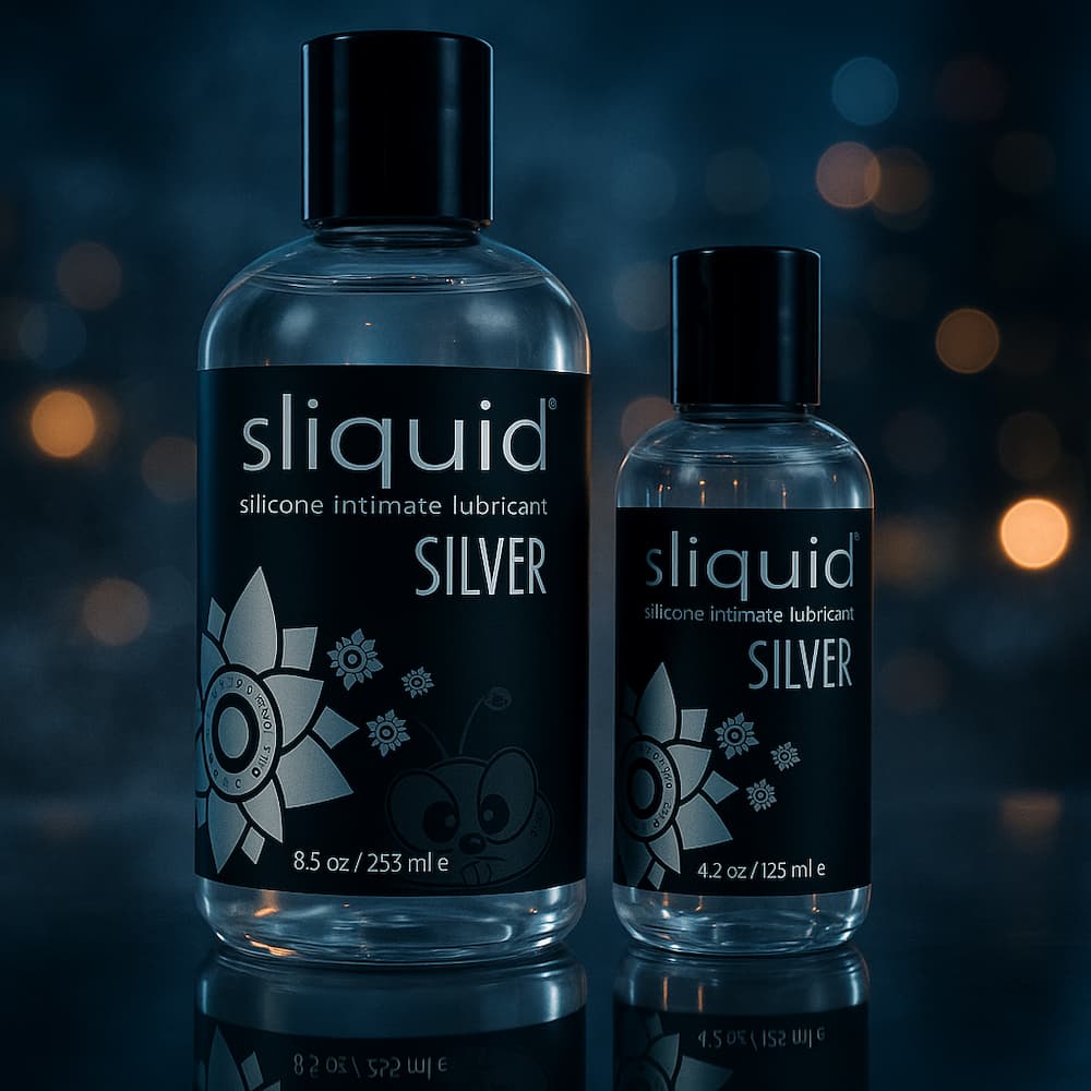 Two Sliquid Silver silicone lubricant bottles on a dark illuminated display