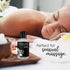 Sliquid Silver bottle beside a woman resting during a massage