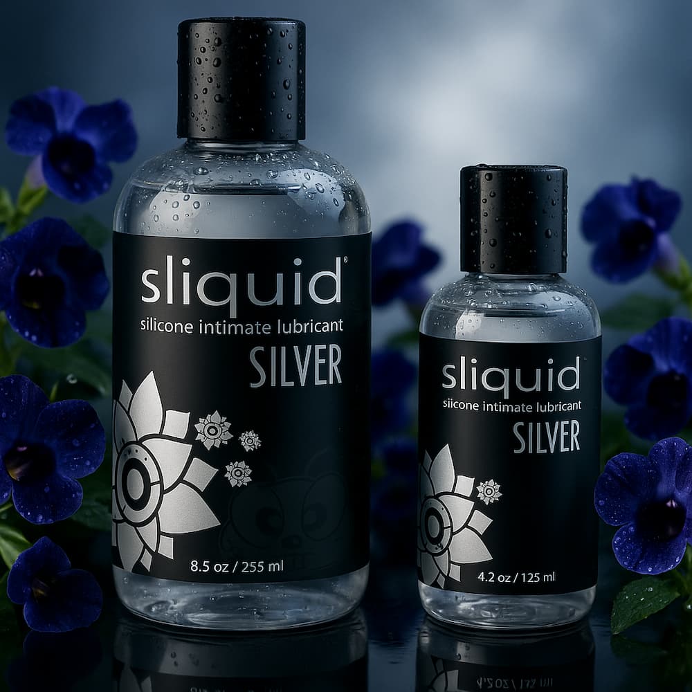 Sliquid Silver bottles surrounded by purple flowers and water droplets