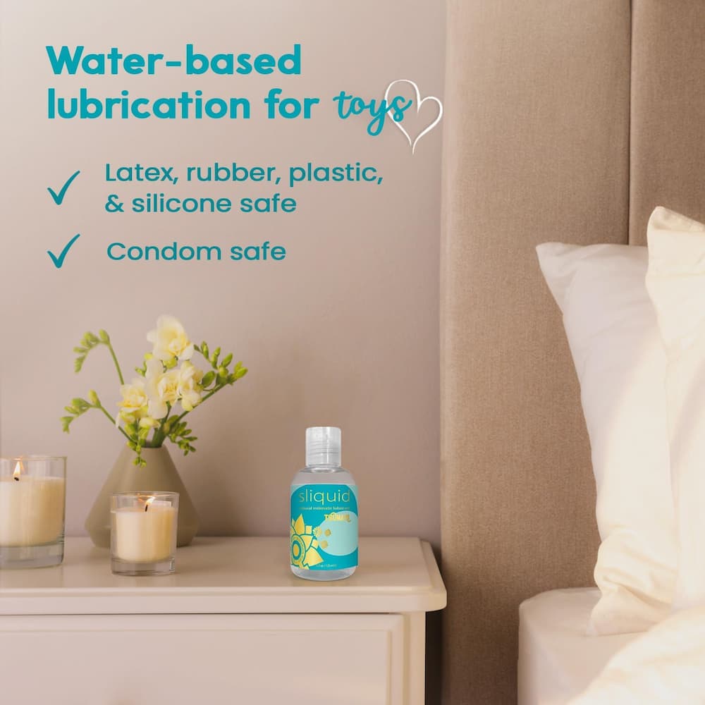 Sliquid Tsunami on a bedside table with toy and condom compatibility information