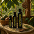 SPUNK Natural bottles beside a basket of avocados on a sunlit table
