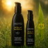 Wicked Aqua Sensitive lubricant pump bottles among sunlit grass and leaves
