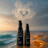 Wicked Hybrid lubricant bottles beside ocean waves and golden sand
