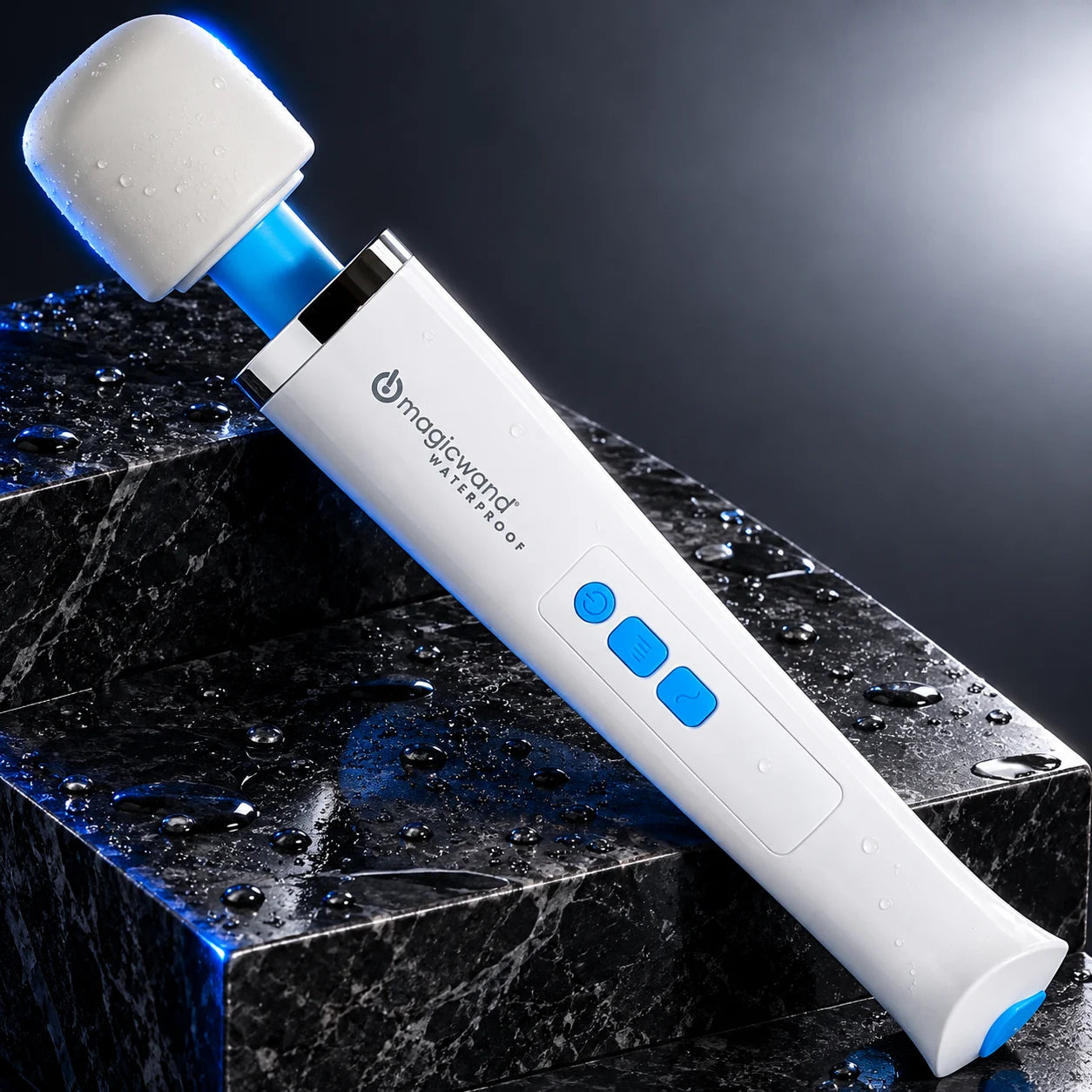 Magic Wand Waterproof with three blue control buttons on a dark studio pedestal.